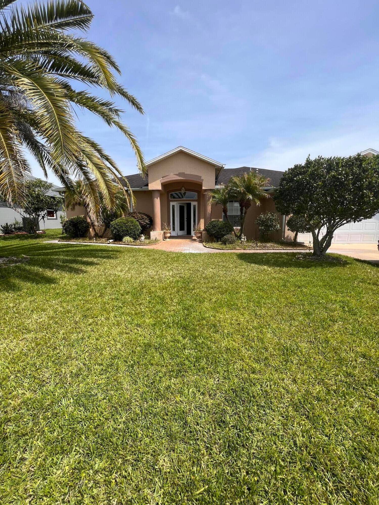 Specious beautifully maintained home at Matanzas Woods with No HOA.