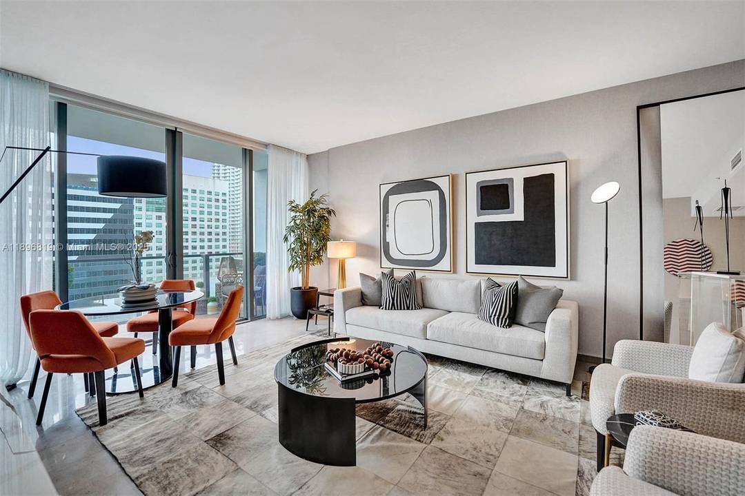 PRICED to SELL. FABULOUS TURN KEY FURNISHED CONDO Best place to LIVE, WORK and EXPERIENCE the vibrant MIAMI lifestyle.
