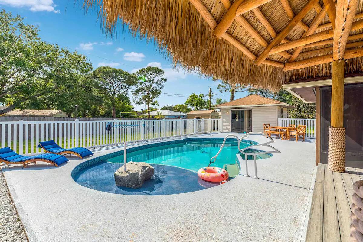 Picture yourself sipping cocktails under swaying palms in your private, sprawling retreat !