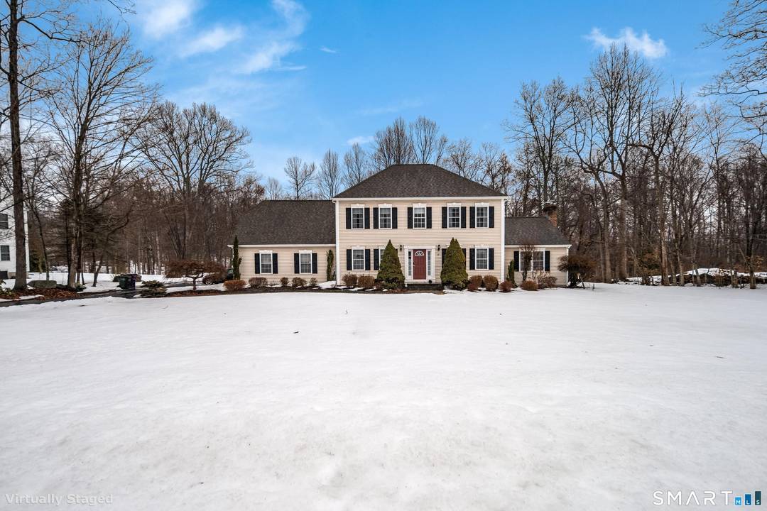 This spacious Colonial designed for comfort, functionality, and effortless entertaining.