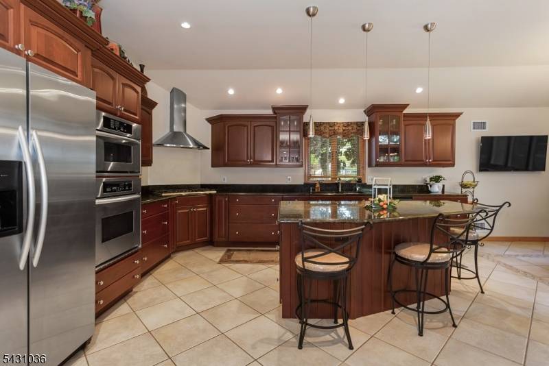 Exceptional craftsmanship, true pride of ownership define this impeccably maintained 4 bedroom, 3.