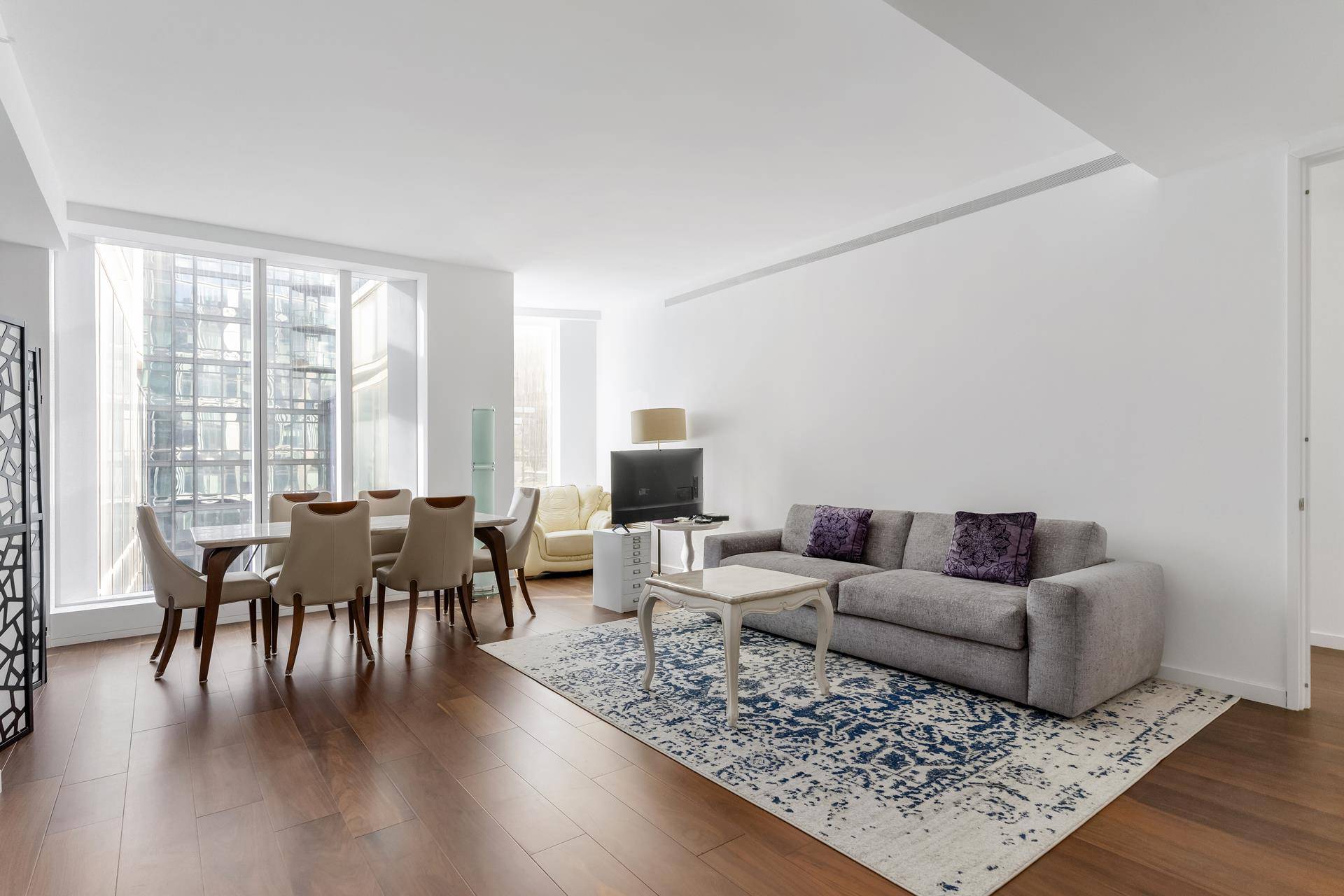 One West End it is a sculptural glass residential tower with exterior Architecture by Pelli Clarke and Interiors designed by Jeffrey Beers.