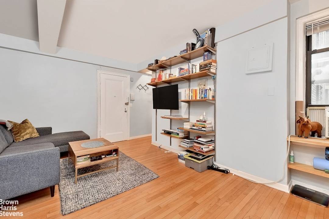 This mint condition studio with separate kitchen and full bath is located on a quiet tree lined street in one of the most distinctive co ops in the East Village.