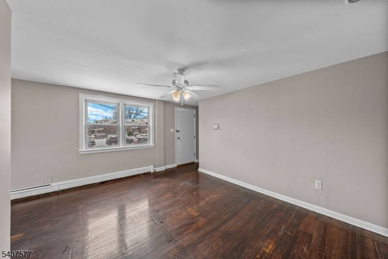 Two family property with two bedroom units and hardwood floors.