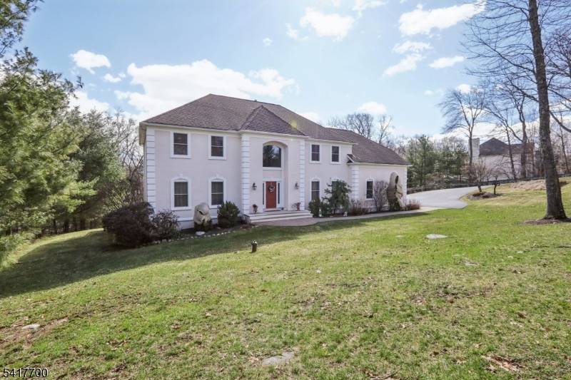 Stunning Colonial set on approximately 3 acres offers an impressive two story Entry Foyer with dual closets, Formal Dining room accented with crown molding and chair rail, Living room that ...