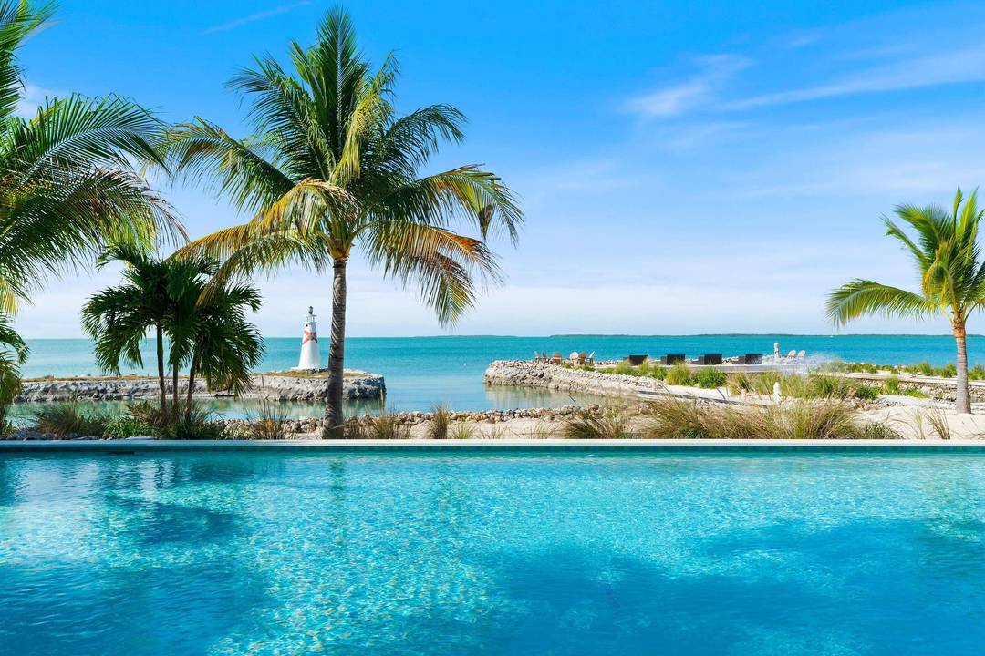Escape to your own tropical paradise with this dreamy, ultra luxurious 6 acre estate on Key Largo Bay, just one hour south of Miami.