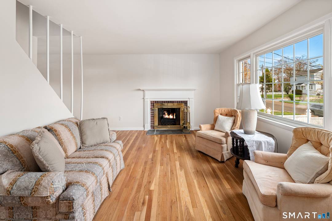 A wonderful 4 bedroom Cape Cod Style home in the Newfield section of Stamford.