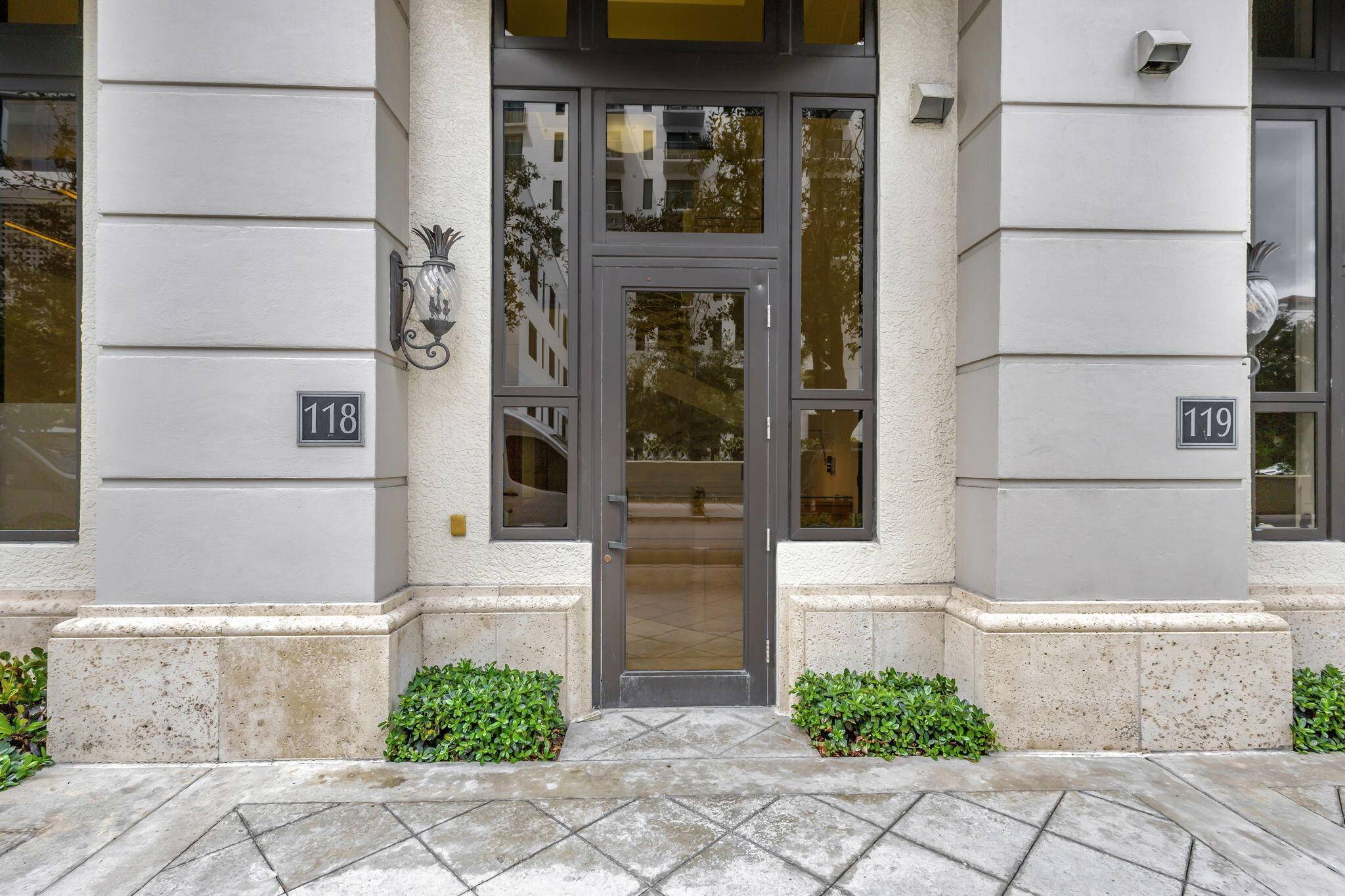Welcome to this exceptional ground floor unit in Two City Plaza, offering the perfect blend of sophistication and versatility for both commercial and residential purposes.