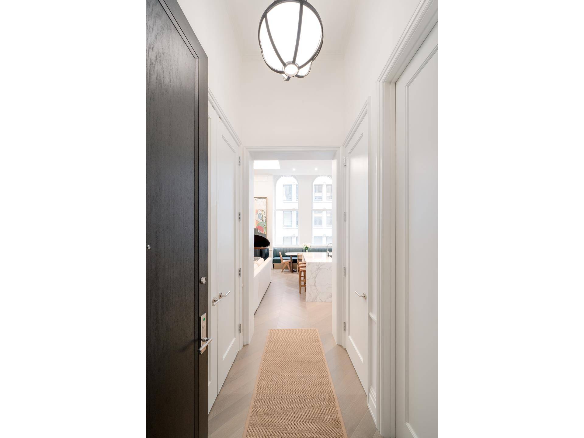 Unique to the B line, residence 5B offers unmatched scale and volume with ceilings soaring over 15 feet in height and elegant, tall arched windows.