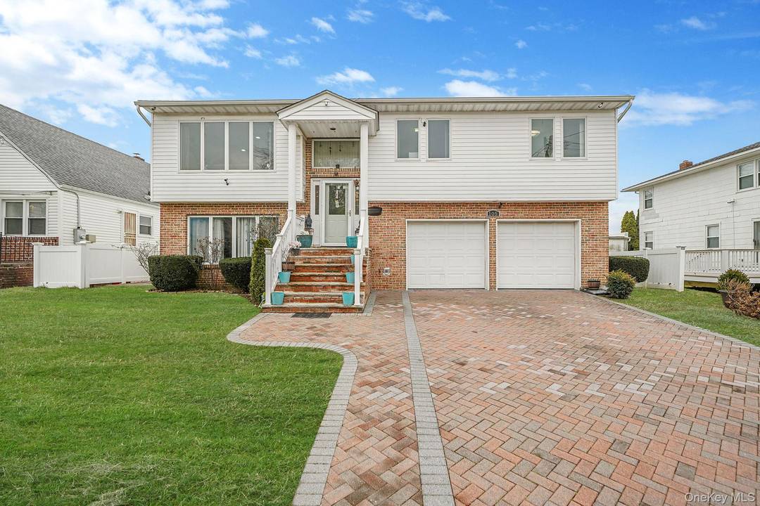 Welcome to 105 Arlington Street, Mineola where modern upgrades meet timeless comfort in the highly desirable East Williston School District.