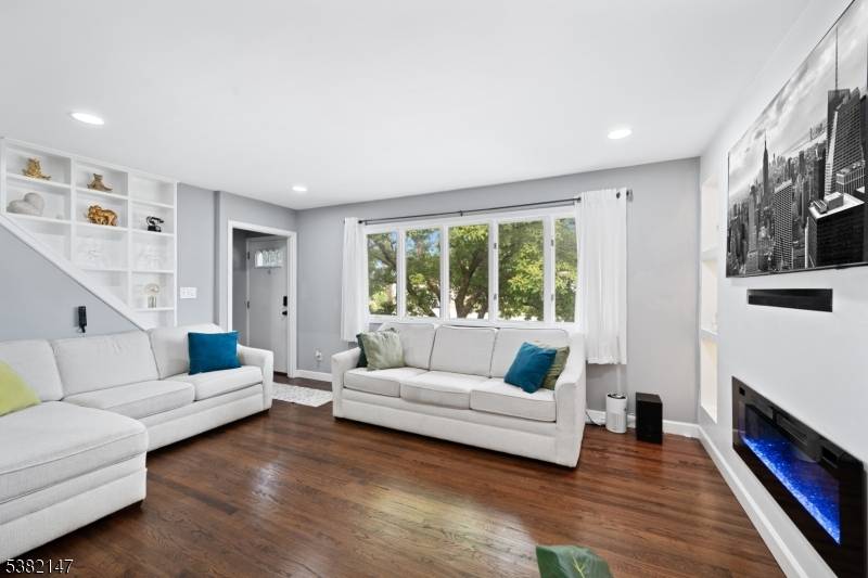 Welcome to this beautifully expanded Cape Cod in the sought after Greg Lawn section of Clifton !