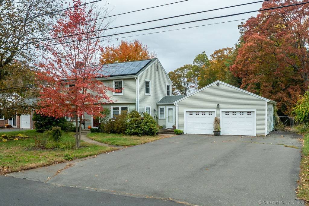 Welcome to this warm and inviting Colonial offering over 2, 600 sq.