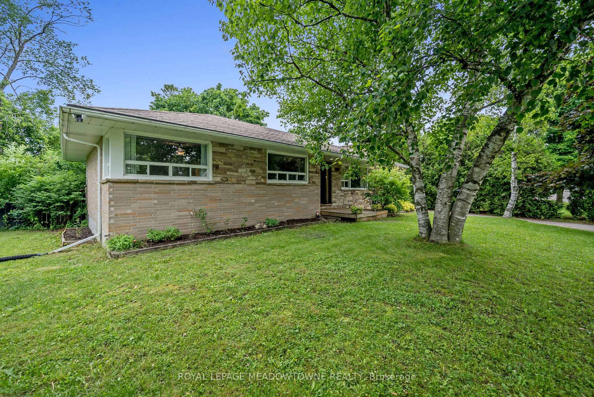 Nestled on a quiet, tree lined street just a short walk from the heart of downtown Erin, this delightful 5 bedroom home is tailor made for family living and creating ...