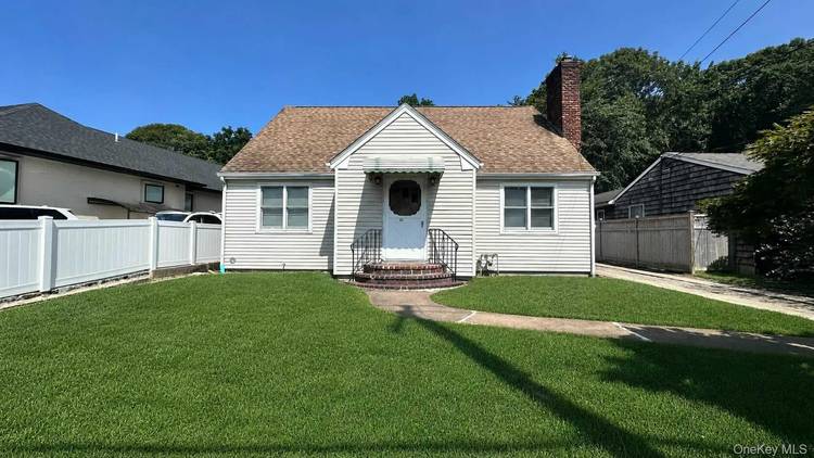 Enjoy the space, comfort and coastal charm of this four bedroom Cape in the heart of Oyster Bay.