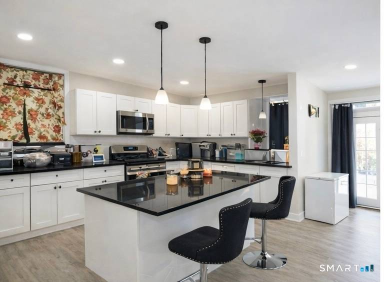 Welcome to 77 Frank Street a beautifully updated 4 bedroom, 2.