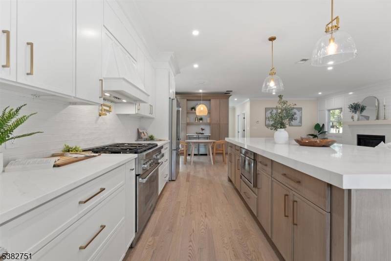 This newly expanded, north facing and fully renovated 5 bedroom, 5 bath luxury home combines timeless craftsmanship with modern design.