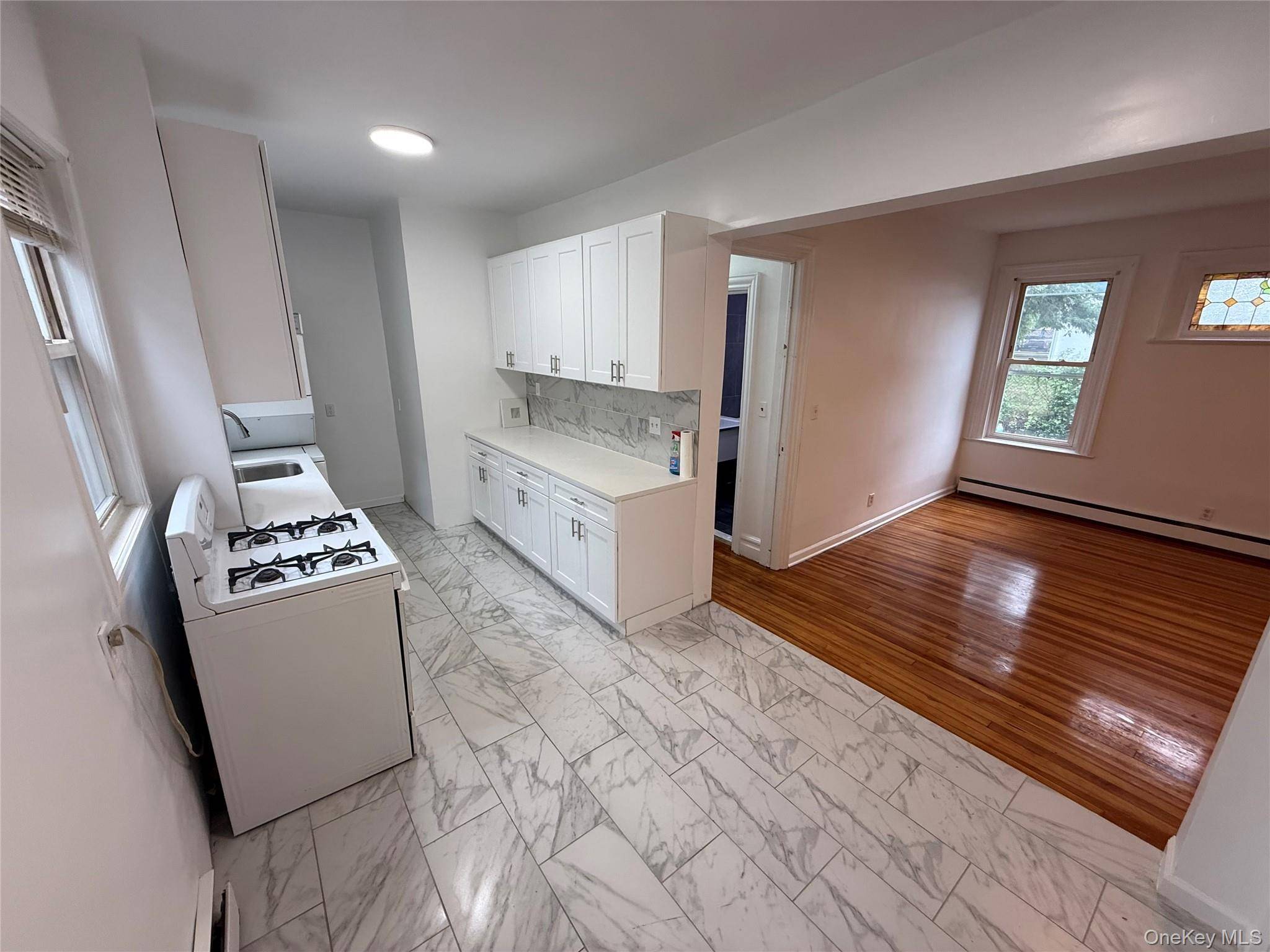 All utilities included ! Just renovated 3 bedroom plus office and enclosed porch on the first floor with a large private porch !