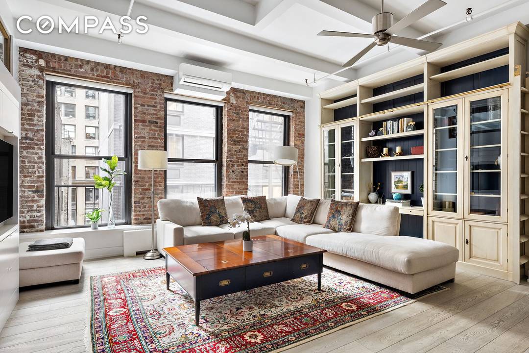 Residence 4S at 114 West 27th Street is a sprawling loft that masterfully blends downtown character with refined modern living.