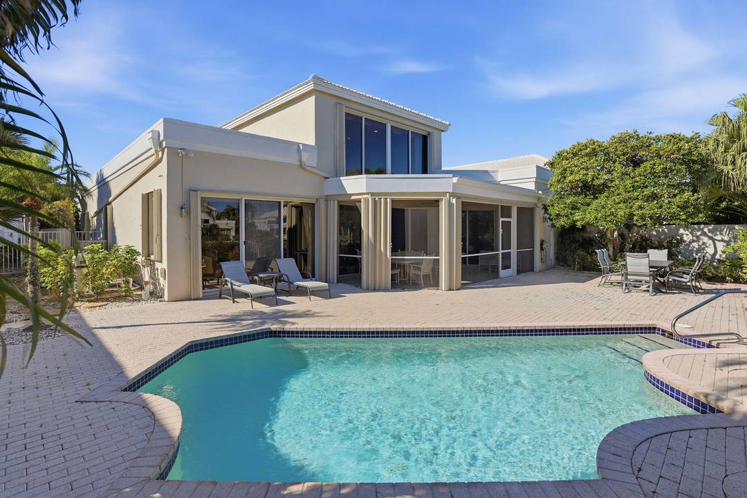 Beautiful two story pool home in The Polo Club offering 3 bedrooms Den, 4 full baths, and a 2 car garage.