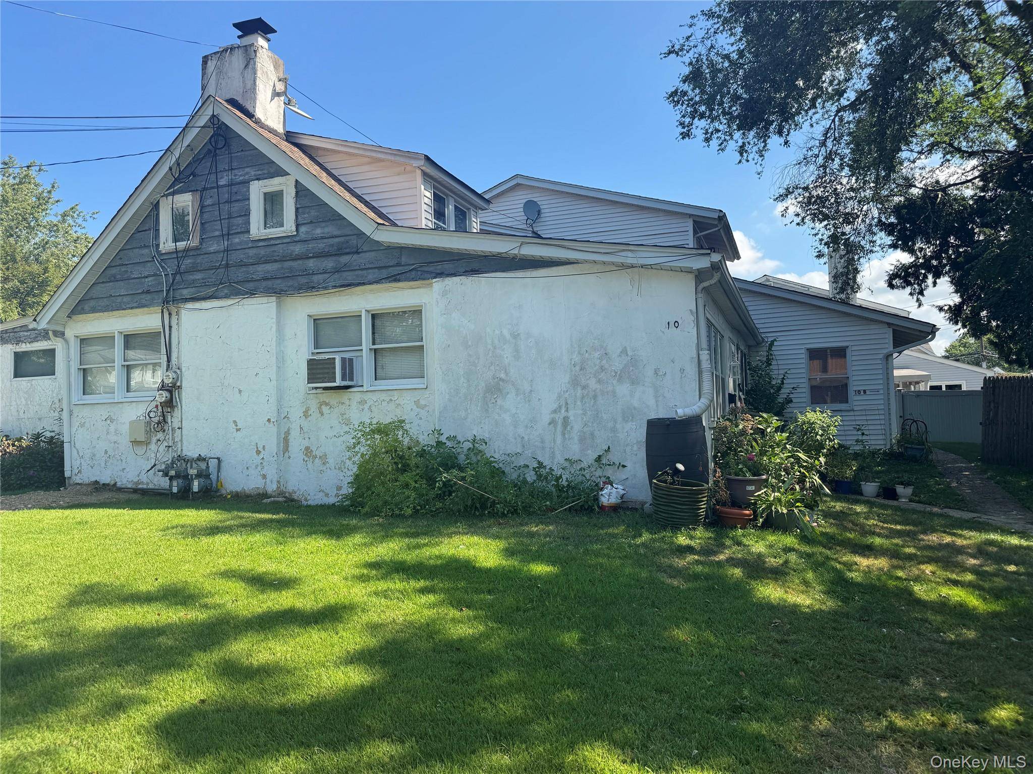 Great investment opportunity Legal 2 family home on 90 x 75 property.