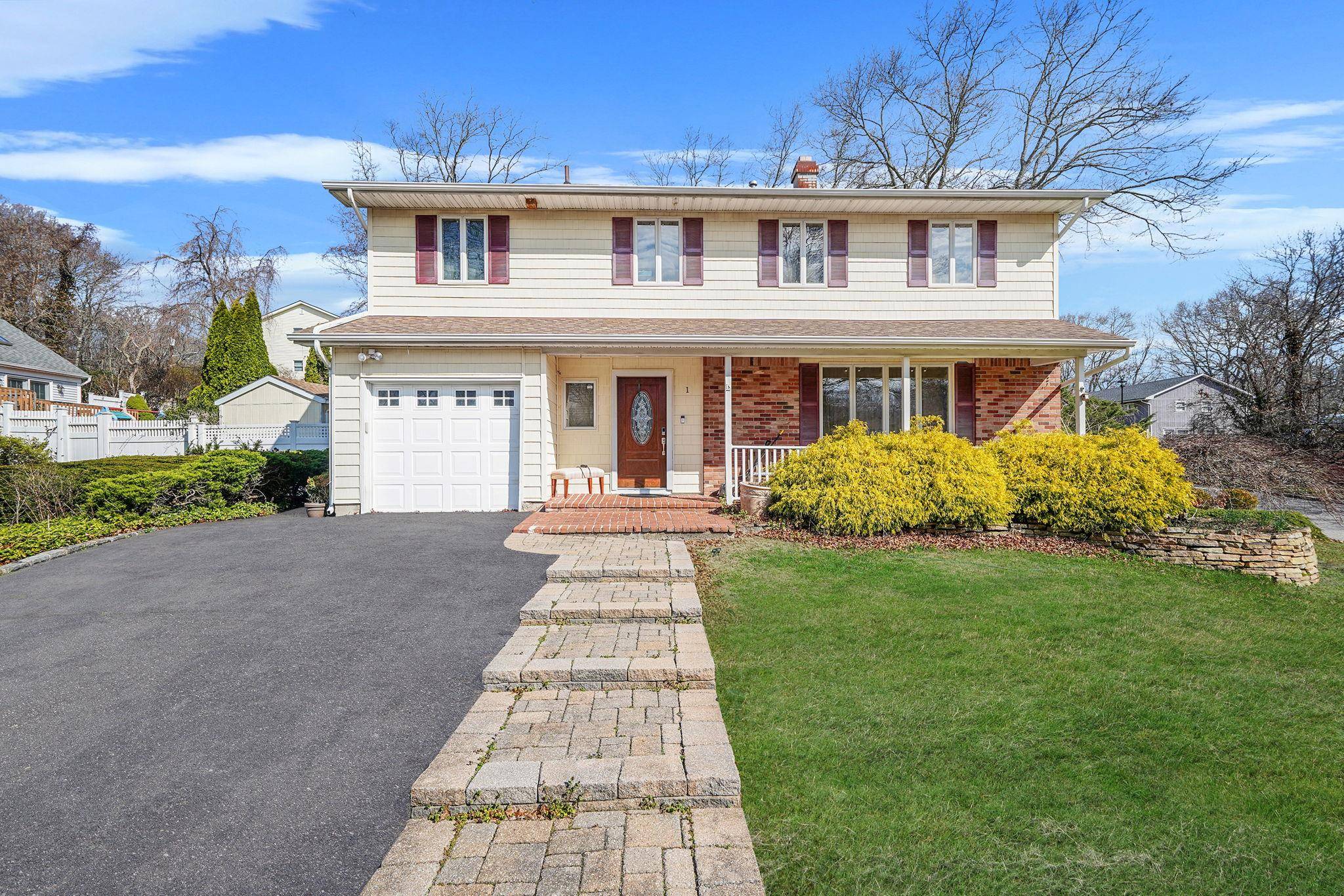 Discover this beautiful colonial home in the heart of Rocky Point.