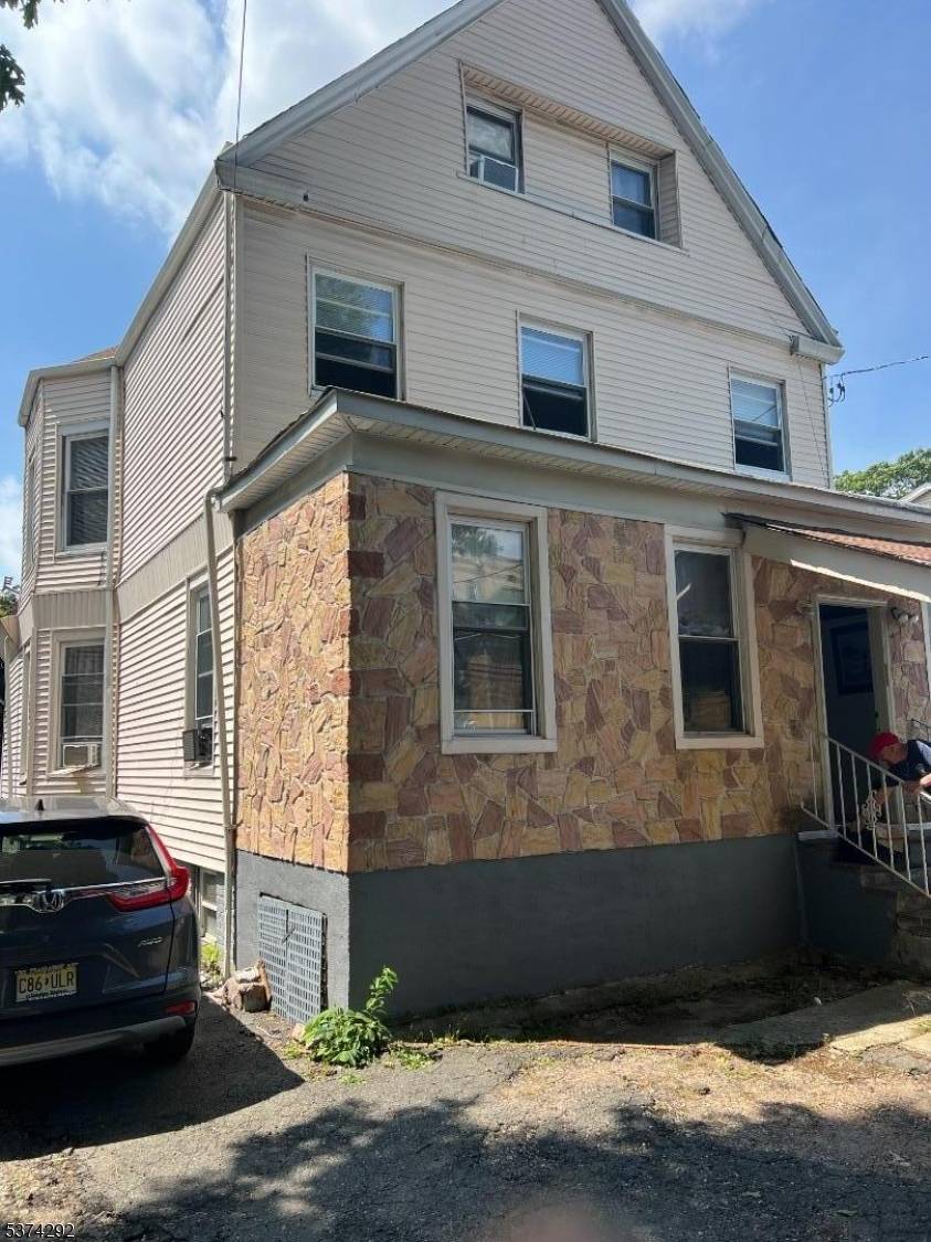 Spacious Multifamily Property in the Heart of Newark Don't miss this incredible opportunity to own a large multifamily home situated on an oversized 50 x 130 lot with parking for ...