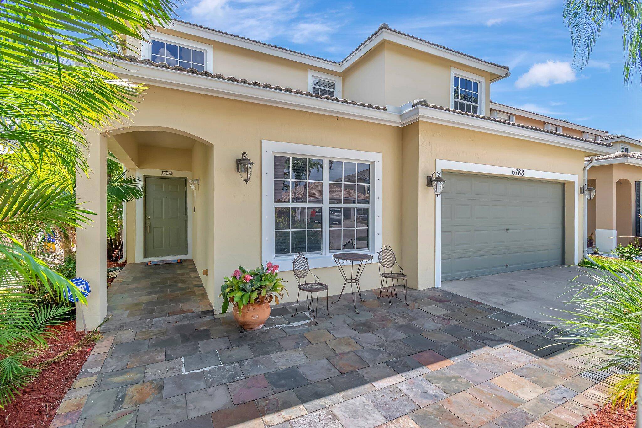 Welcome to this spacious two story single family home located in a gated community, offering both privacy and convenience.