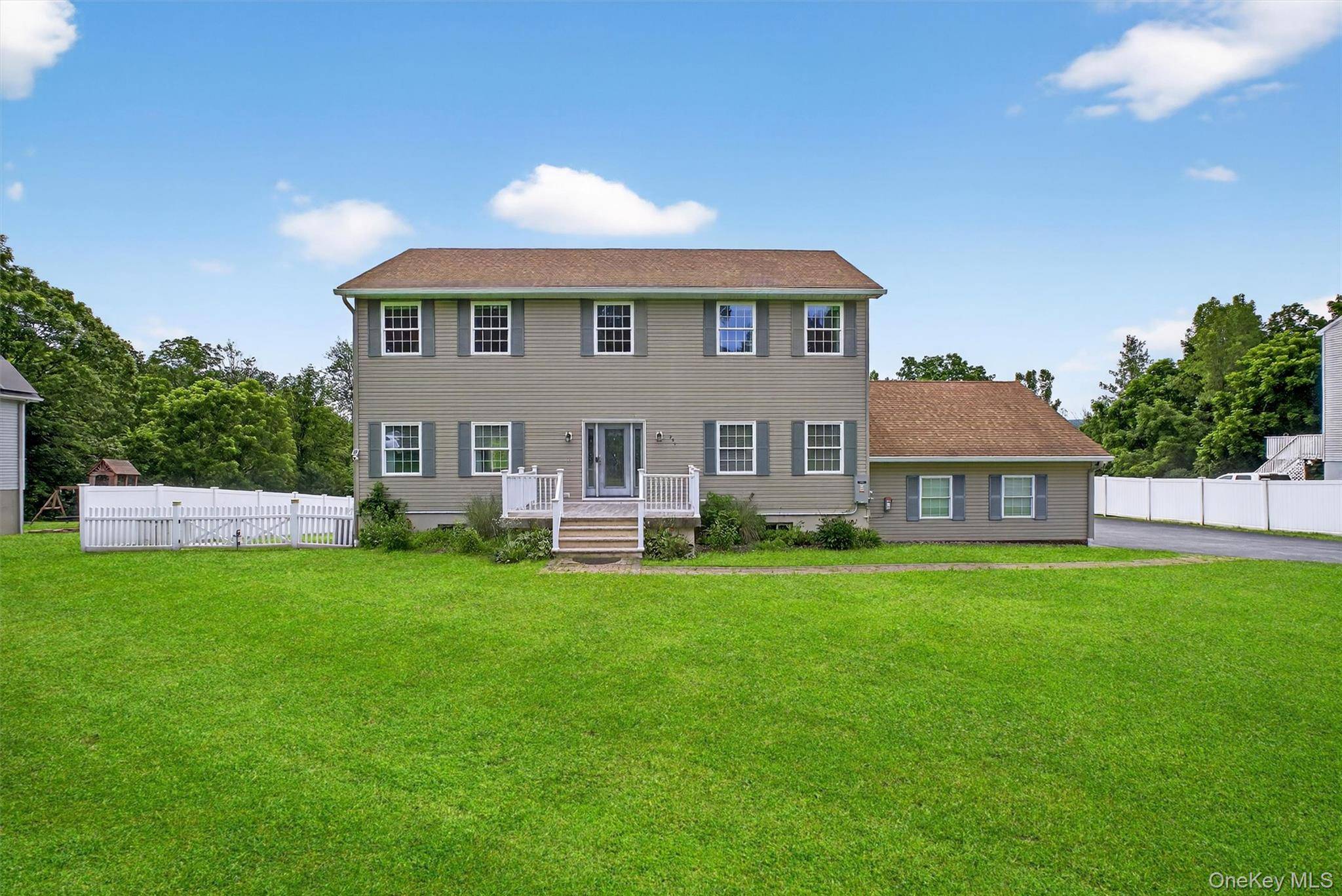 RARE FIND ! Welcome to this beautifully maintained Center Hall Colonial perfectly set on one acre, featuring a Legal Accessory Apartment ideal for family, guests, or rental income !