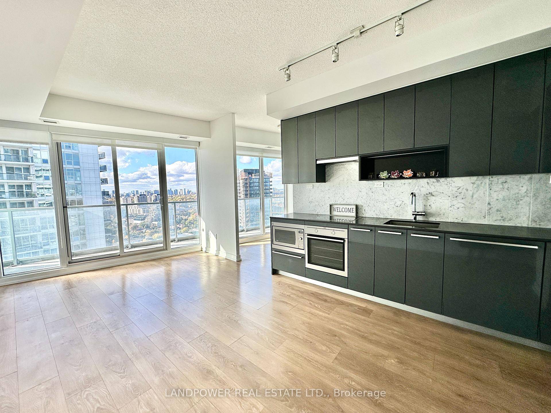 Experience Luxury Living In The Heart Of North York With This Beautifully Sun Filled One Bedroom Plus Den Suite, Nestled In The Prestigious Bayview Village Community.