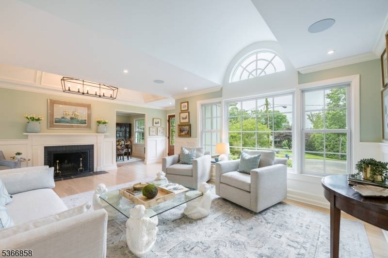 SUN FILLED STORYBOOK HOME IN SUMMIT STUNNINGLY RENOVATED WITH LUXURY FINISHES !
