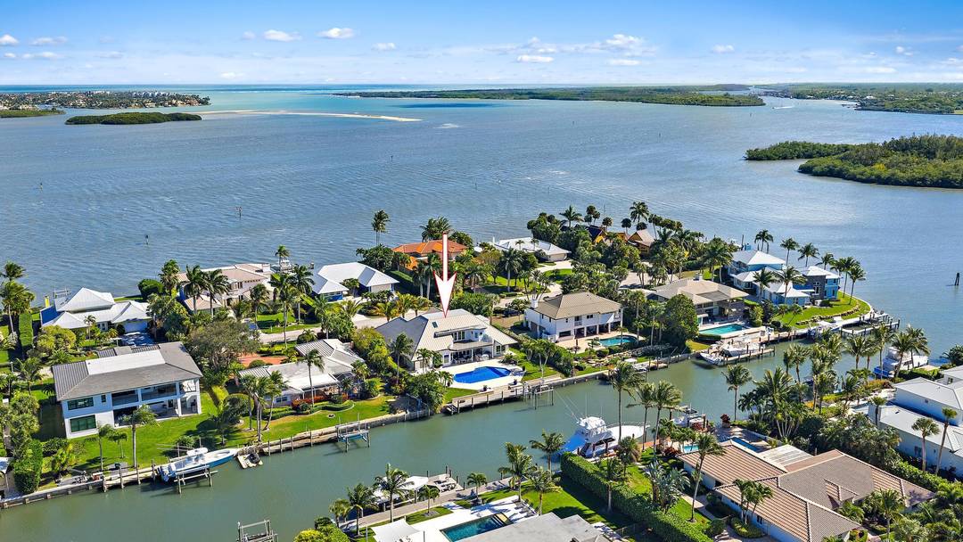 One of a kind waterfront residence in the exclusive High Point Island enclave off Sewall's Point, set along a rare blue water canal with deep water access, completely rebuilt in ...