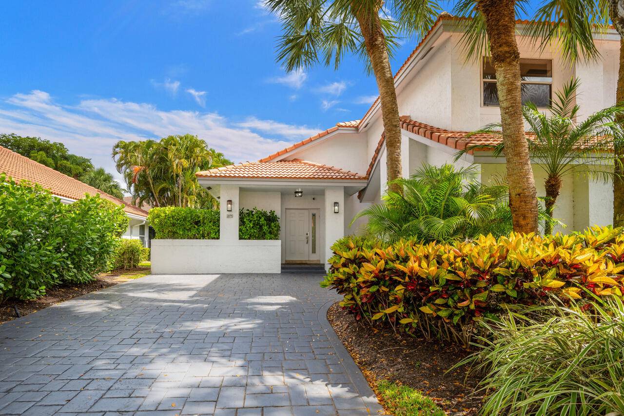 Welcome to this beautifully maintained 2 story townhome located in the desirable village of Cedar Cay within the prestigious Broken Sound Country Club.