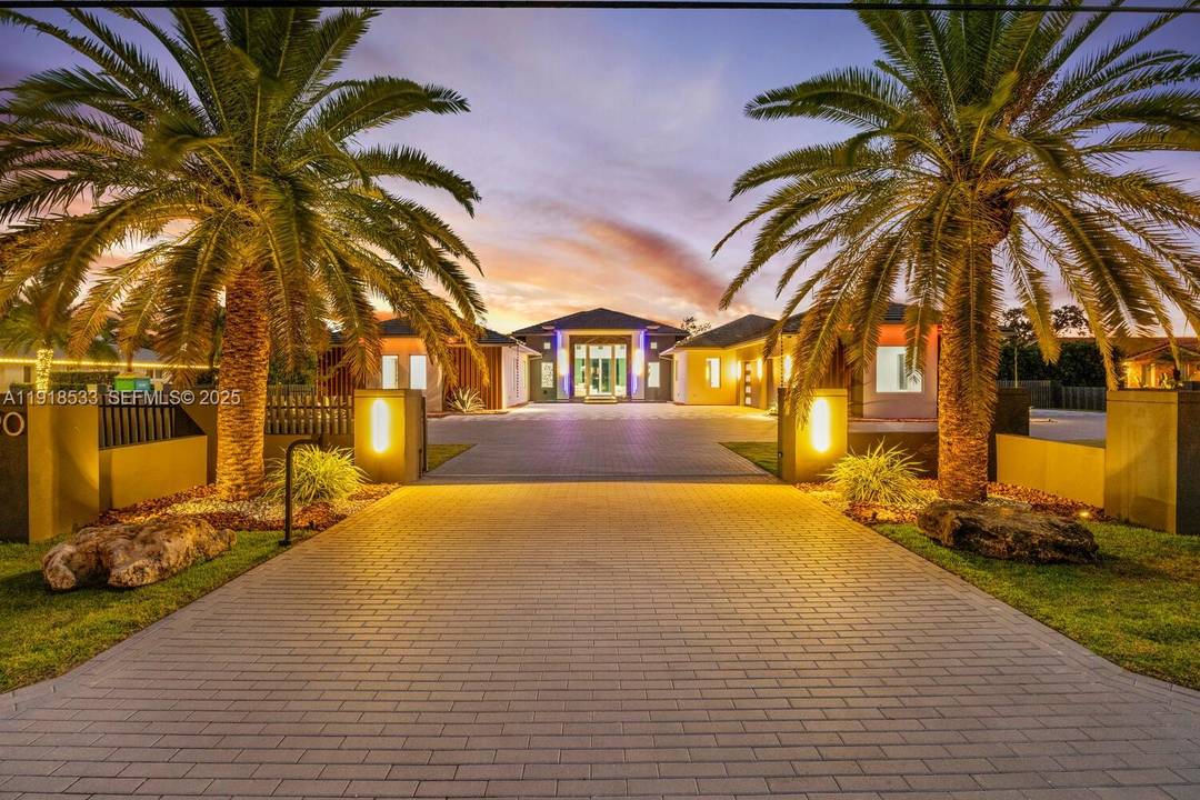 Experience modern luxury in this exceptional 1 story estate offering 6 bedrooms, 6.