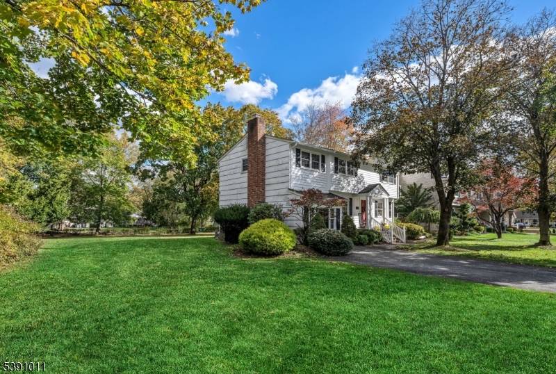Welcome to this meticulously maintained 4 bedroom, 2.
