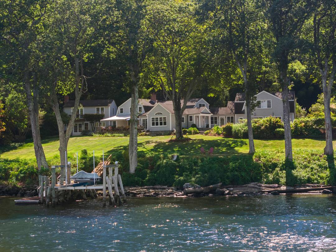 Set along a coveted stretch of the Connecticut River, this stunning, turnkey waterfront compound offers a rare convergence of privacy, protected views, and deep water access just over one mile ...