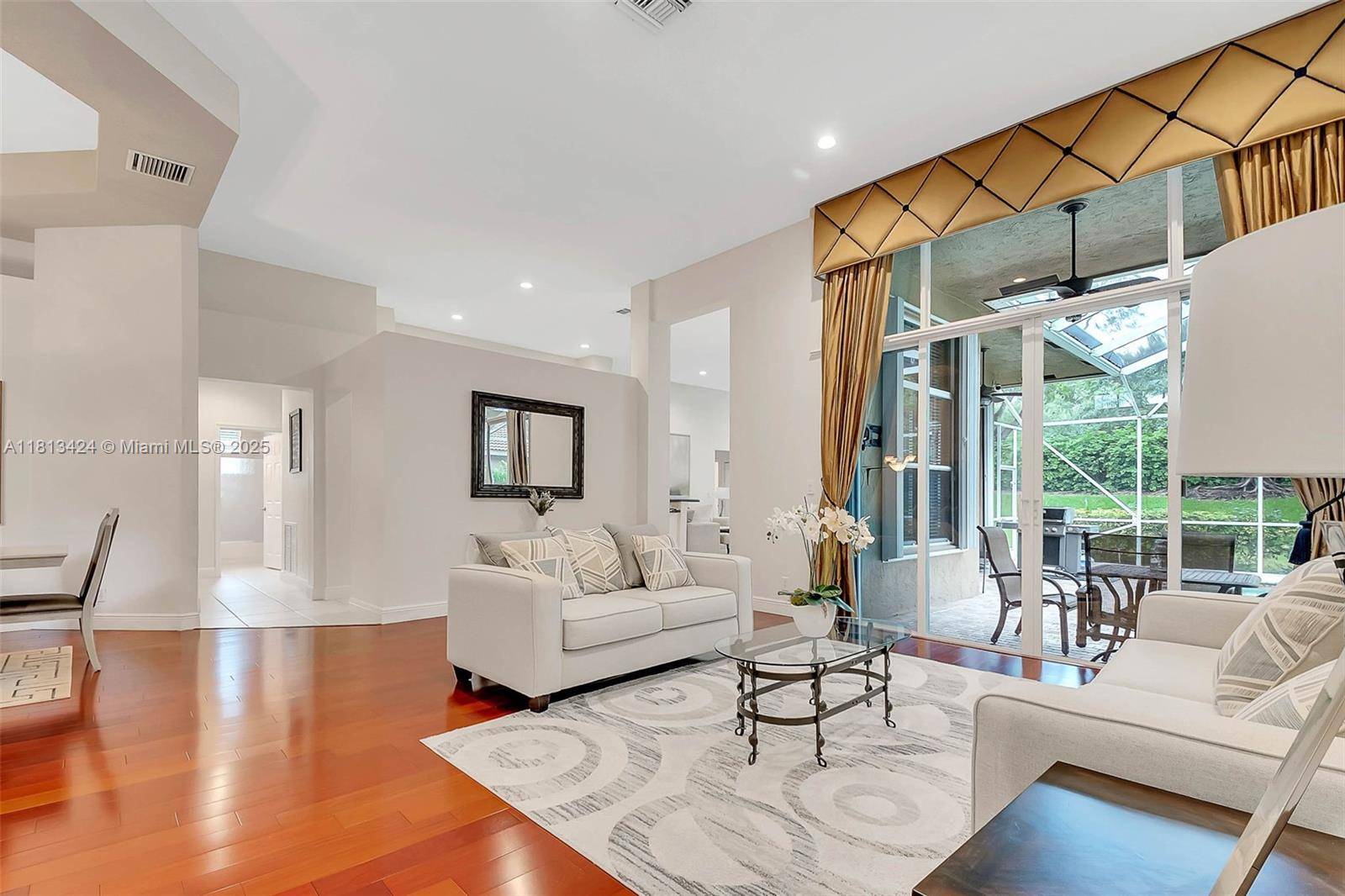 This spectacular residence located in the highly sought after Ridges neighborhood, featuring an open floor plan and privacy with no rear neighbors backing up to a landscaped berm.