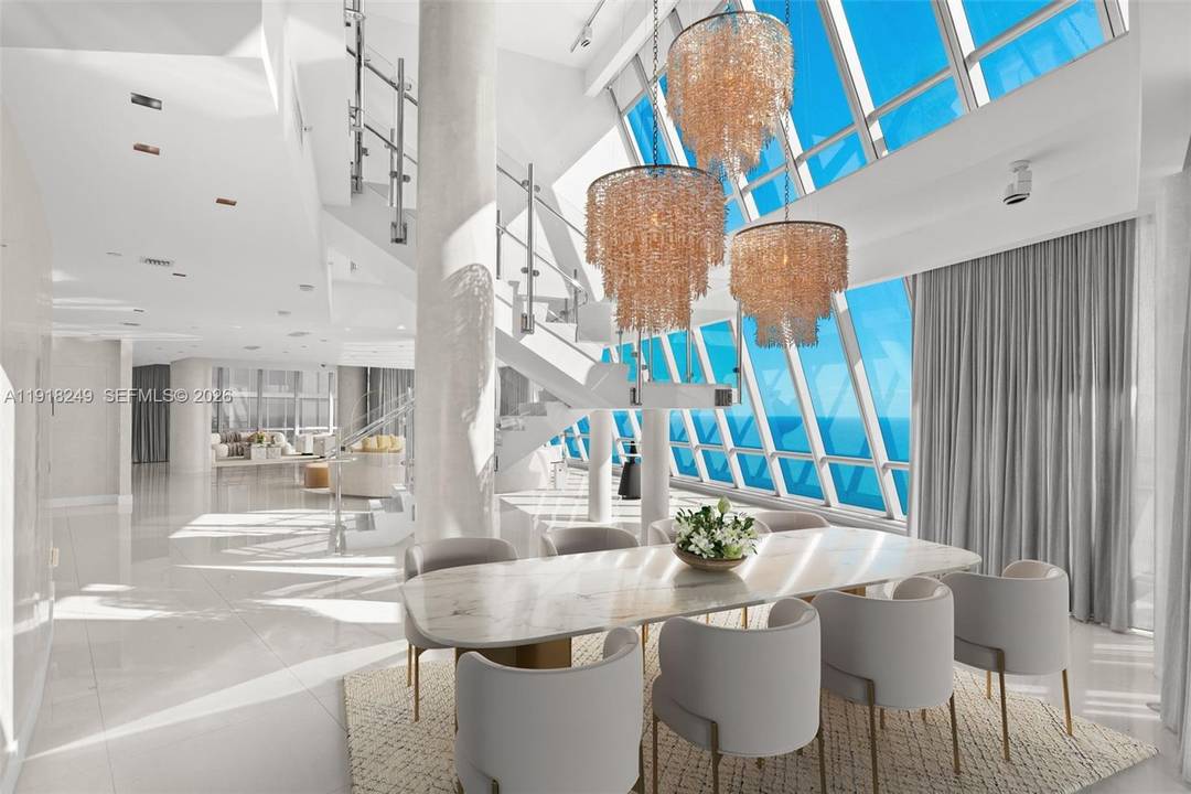 Experience elevated oceanfront living in this reimagined 8, 332 sqft Penthouse showcasing breathtaking 360 degree views of the ocean, downtown Miami, and the intracoastal.