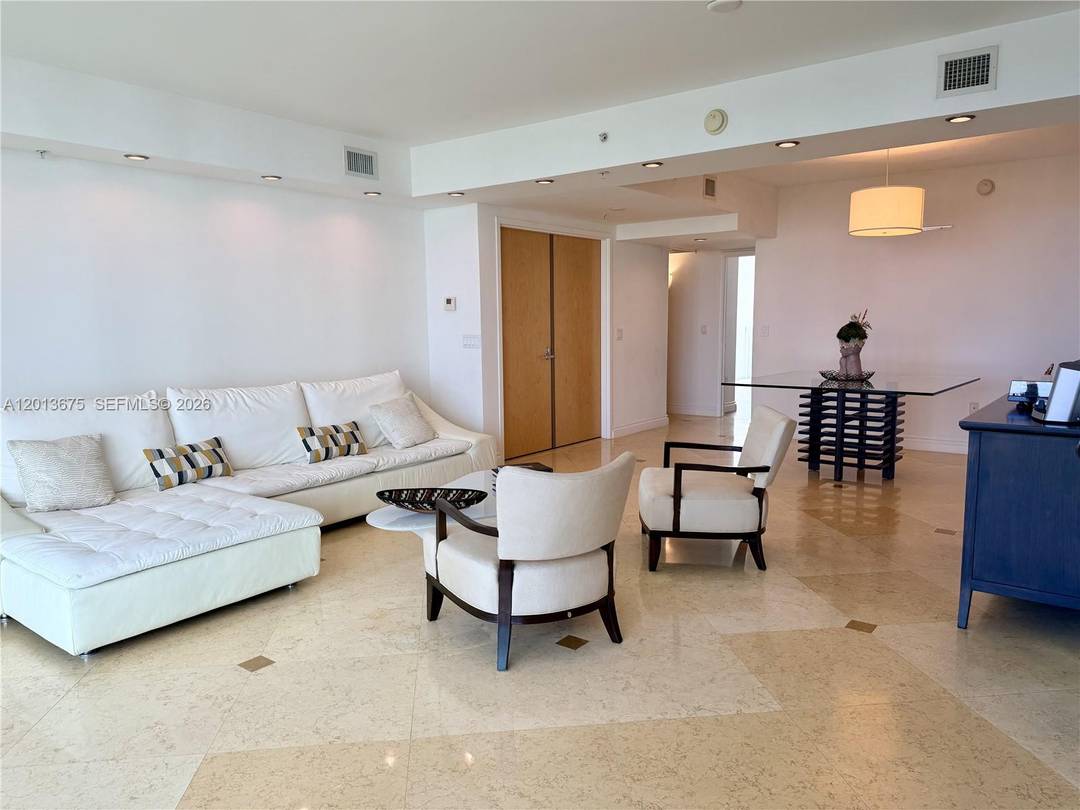 Lovely residence located in The Parc at Turnberry in the heart of Aventura, offering sweeping views of the Intracoastal, ocean, and surrounding marinas.