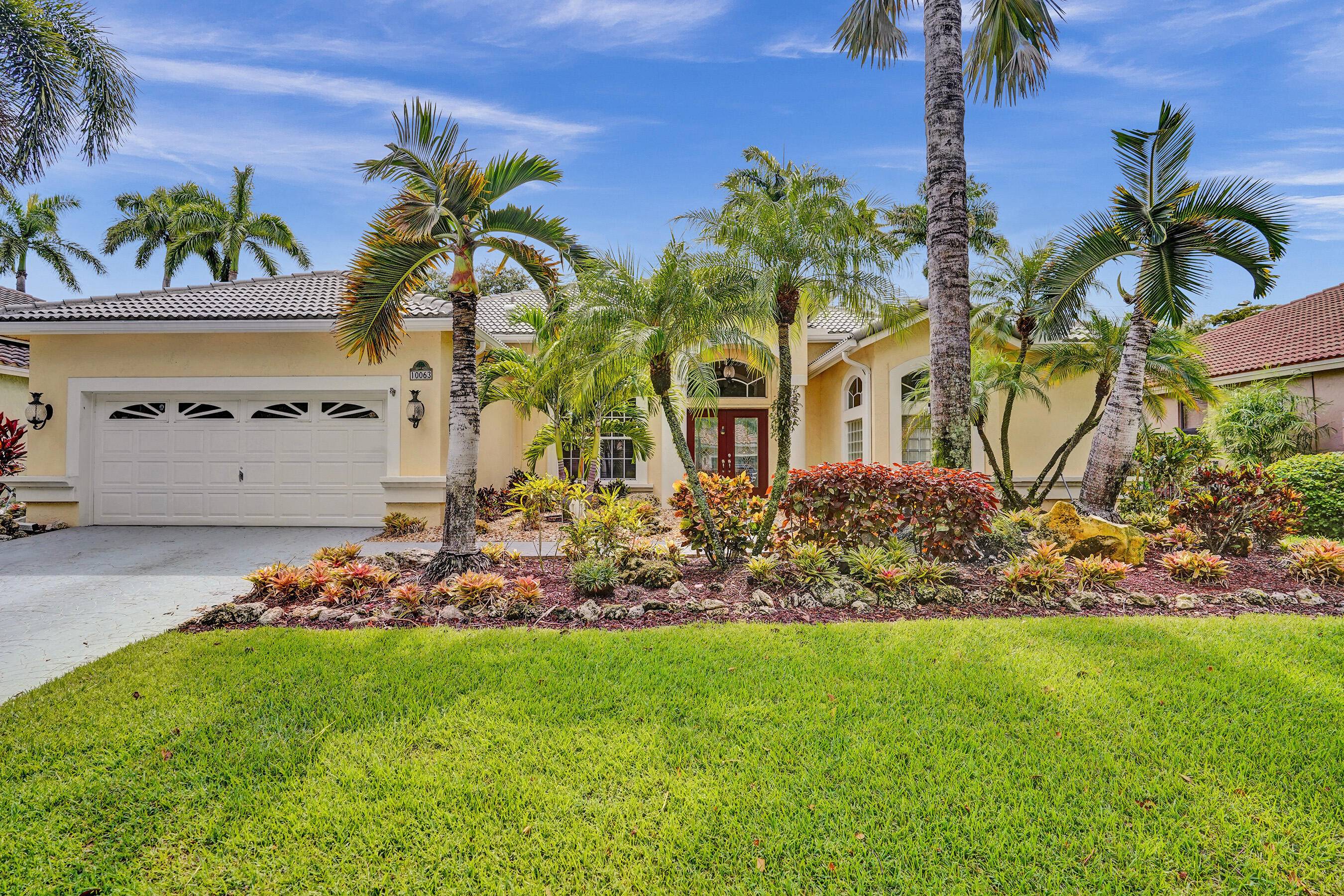 Move in ready ! This Boca Raton gem in exclusive Lexington Estates is perfect for entertaining, outdoor living, and a growing family.