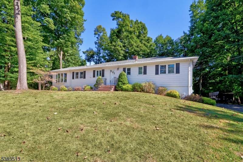 Welcome to this charming 3 bedroom ranch, perfectly tucked away in a quiet, highly desirable neighborhood.