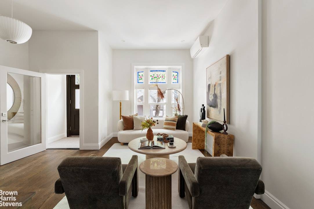 A masterfully renovated brownstone in the heart of South Harlem, 32 West 119th Street blends historic elegance with modern luxury across four expansive levels plus a finished cellar, multiple outdoor ...