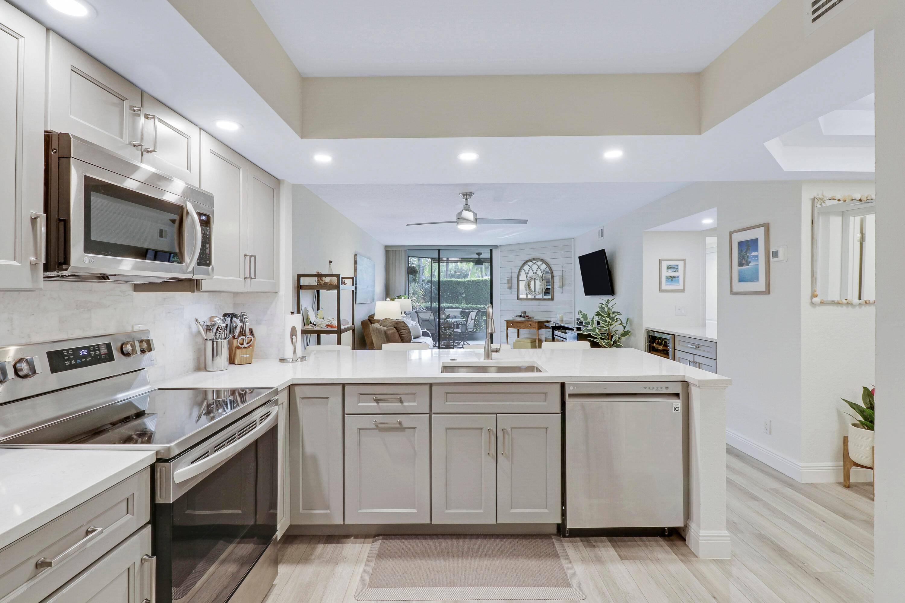 Stunning, Fully Remodeled 2 bed 2 bath ground floor condo in the Resort Community of Bay Colony !