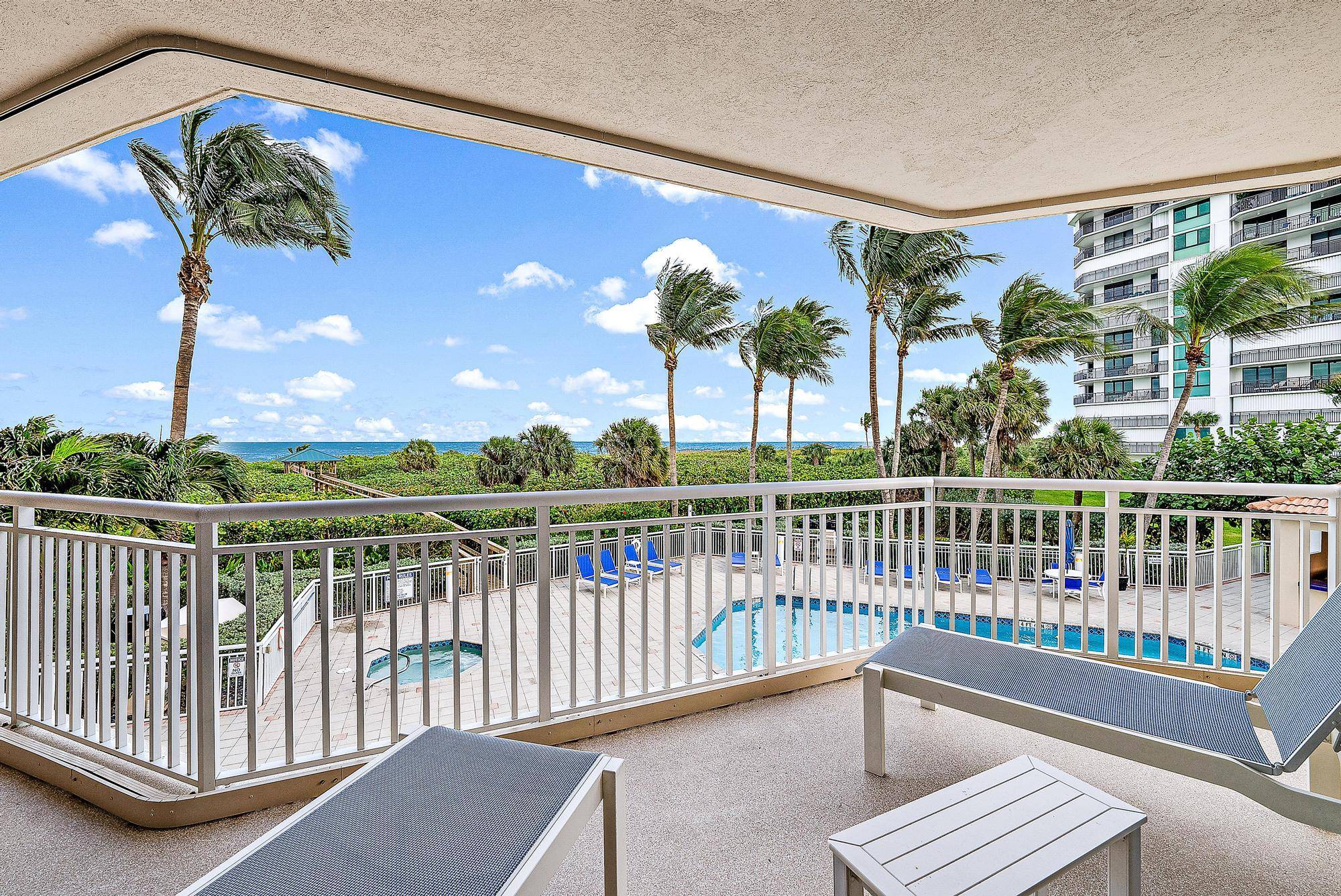 3 bedroom SE corner condo has a large wrap around balcony with full view of the stunning Ocean.