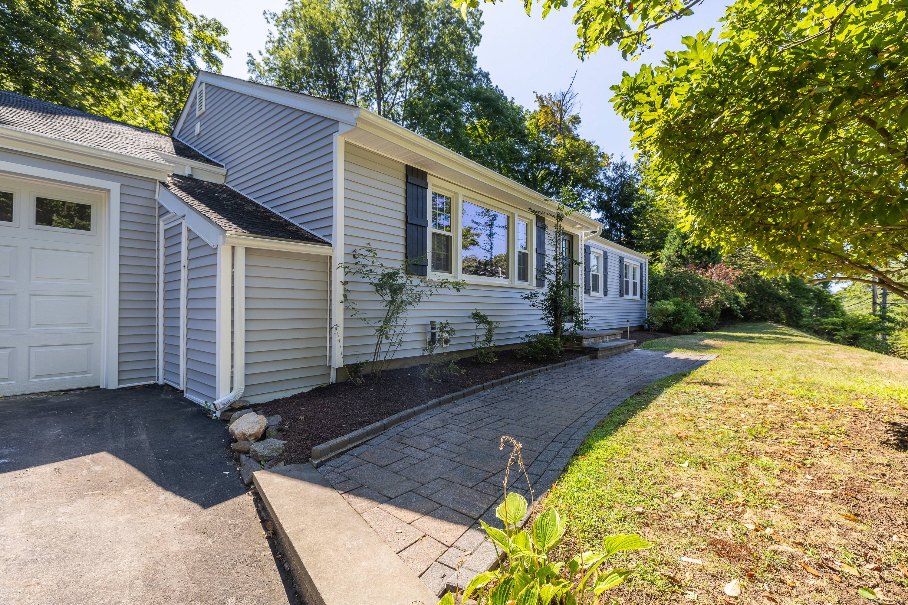 Welcome to 2428 Huntington Turnpike, a beautifully updated oversized ranch in the heart of Trumbull.