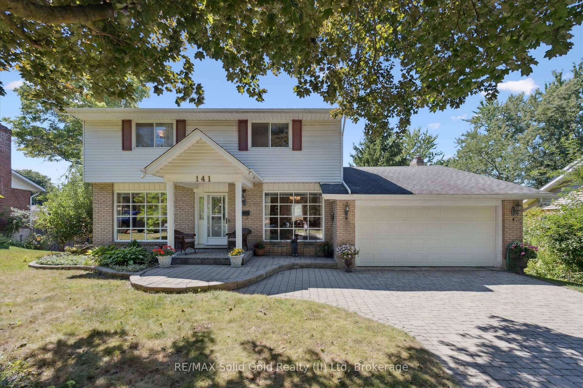 This four bedroom home on a private court in Waterloo offers a true backyard oasis, perfect for family living and quiet retreat.