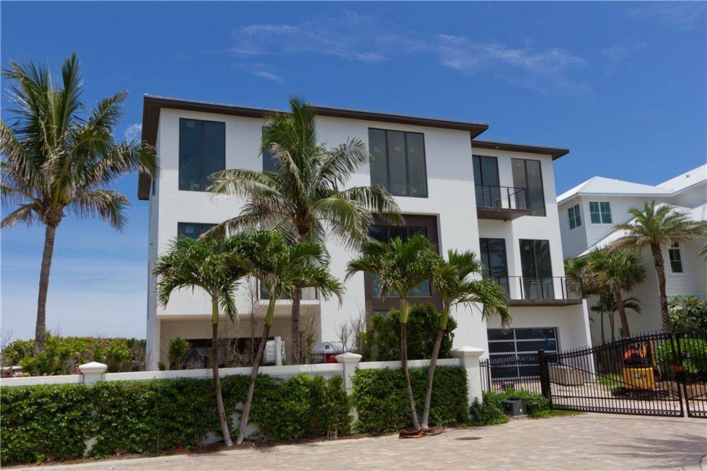 Embrace paradise in this 3 story home boasting panoramic views of the intracoastal ocean.