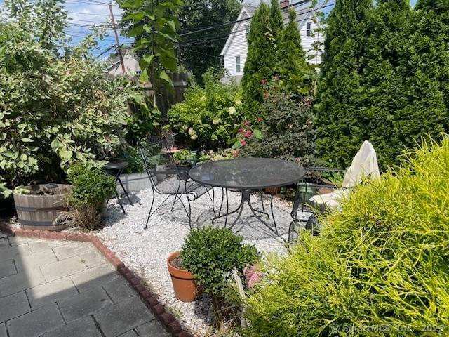 2Family Multifamily in Stamford two separate 2 bedrooms 1 bathroom more living space in the bottom basement floor.