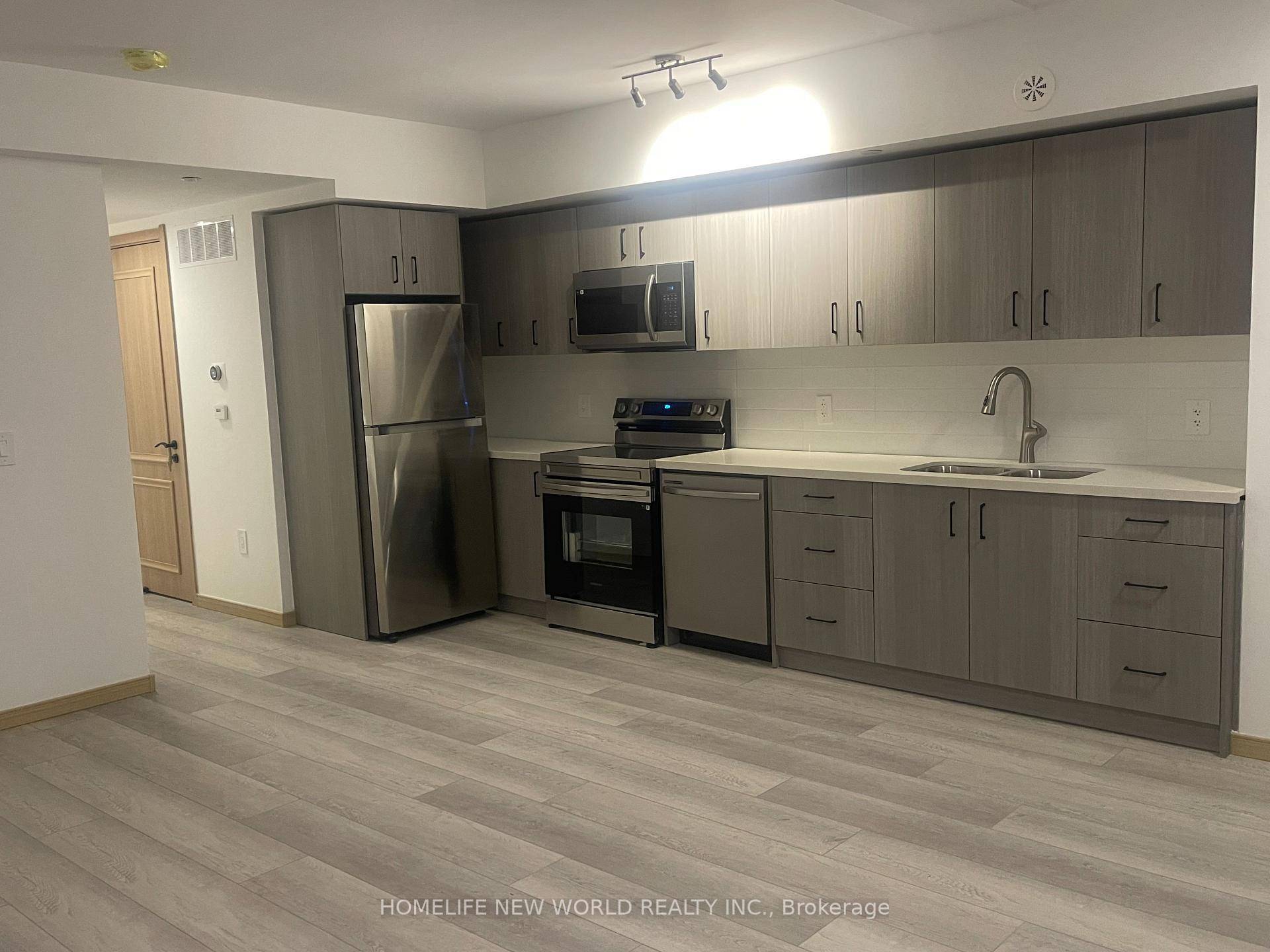 This Brand new and spacious, luxurious 2 bed plus big den, 2 bath condo townhouse features Laminate floors and stainless steel appliances in the modern kitchen.