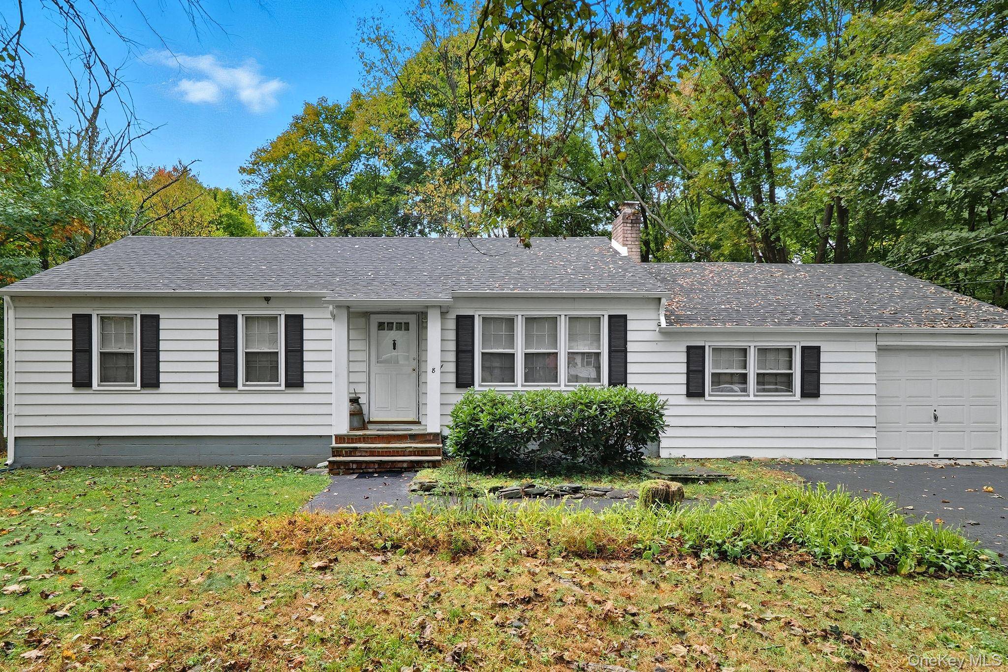Welcome to this beautifully renovated ranch, where comfort meets classic design.
