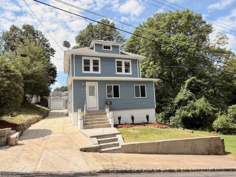 Move Right into this Spacious Updated 3 4 Bedroom Custom Colonial Home that offers high ceilings and an Open Floor Concept !